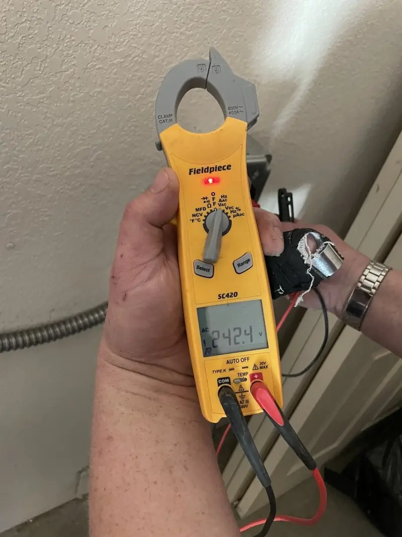 Voltage testing with clamp meter during Circuit Breaker Repair in Welcome